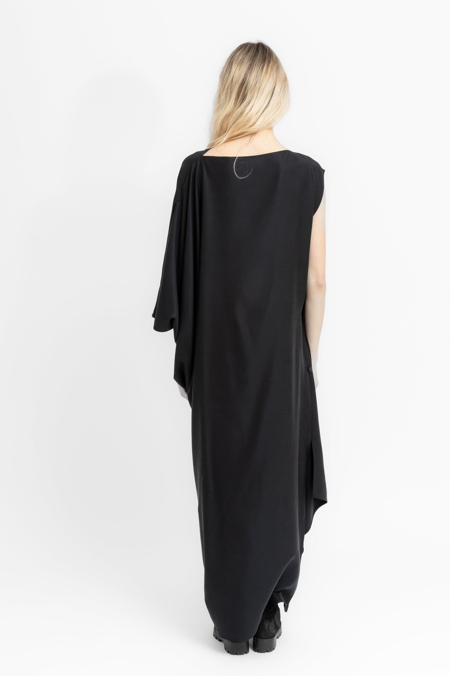 Sierra dramatic draping and flowing geometry in black