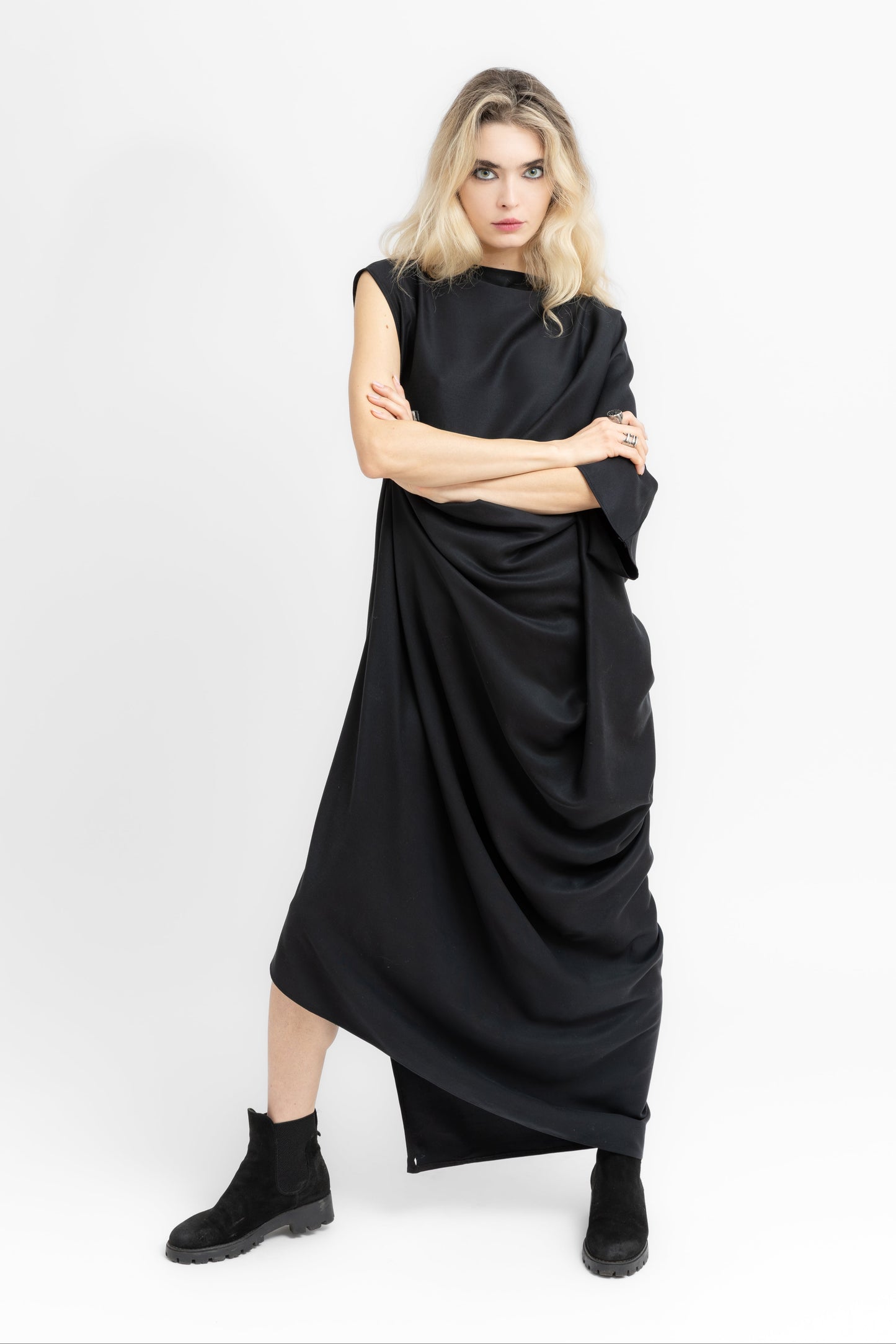 Sierra dramatic draping and flowing geometry in black