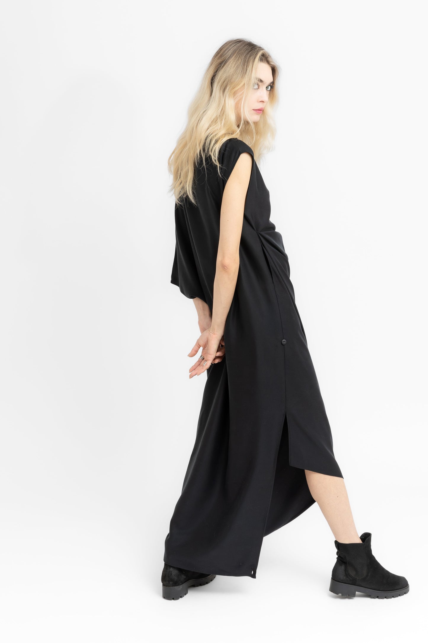 Sierra dramatic draping and flowing geometry in black
