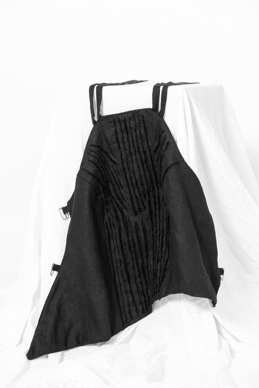 Deconstructed bodice top with raw textured linen