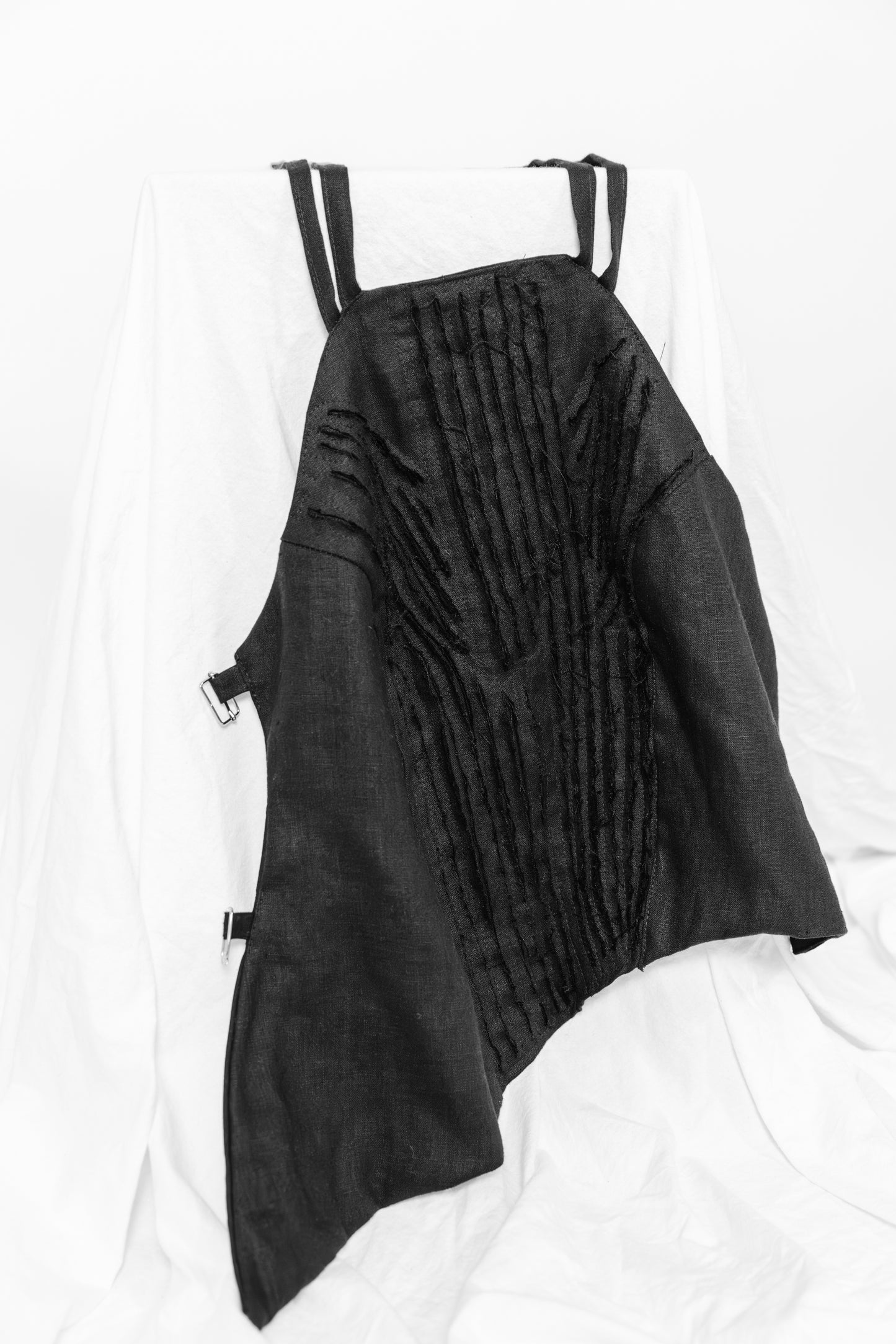Deconstructed bodice top with raw textured linen