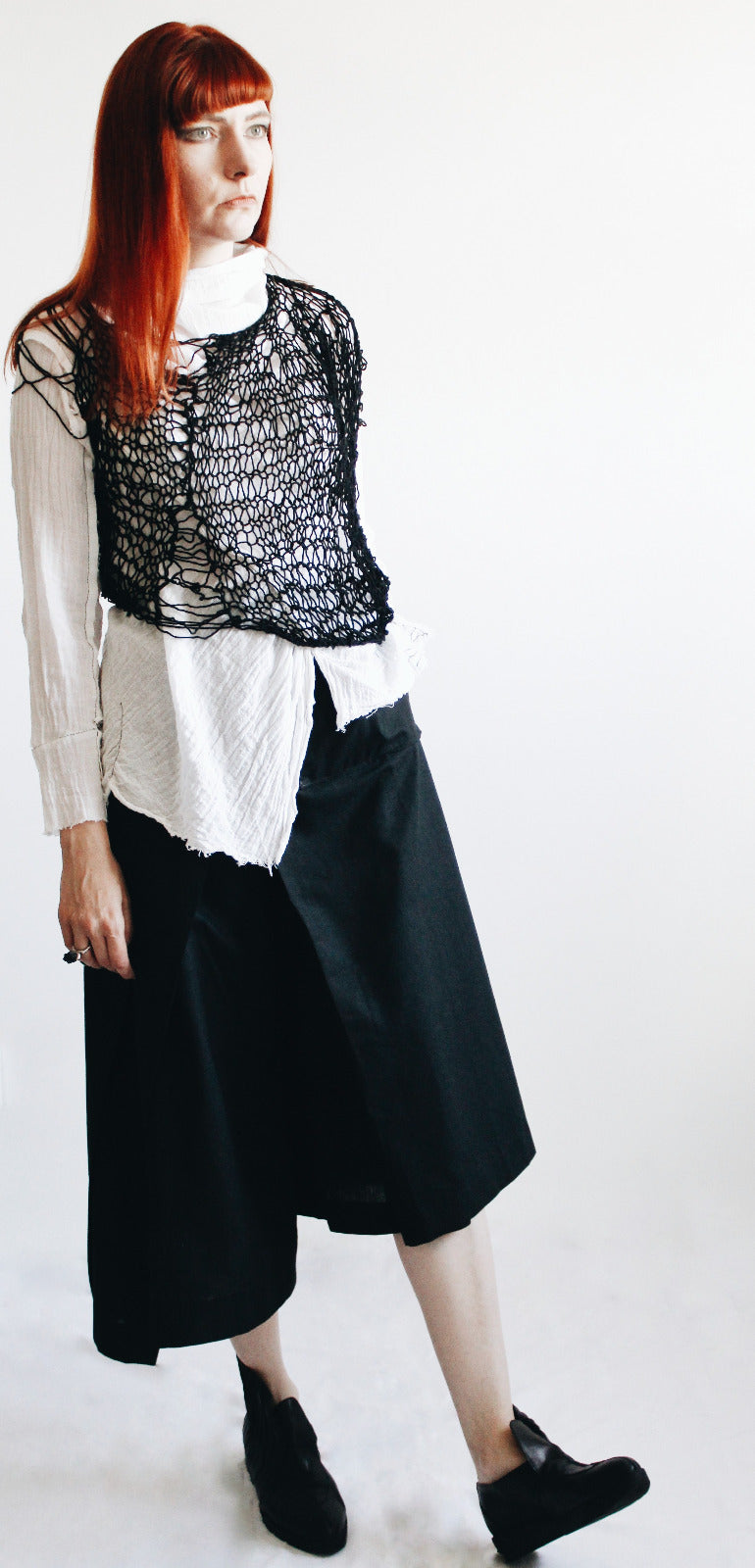 Deconstructed hand knitted avantgarde top