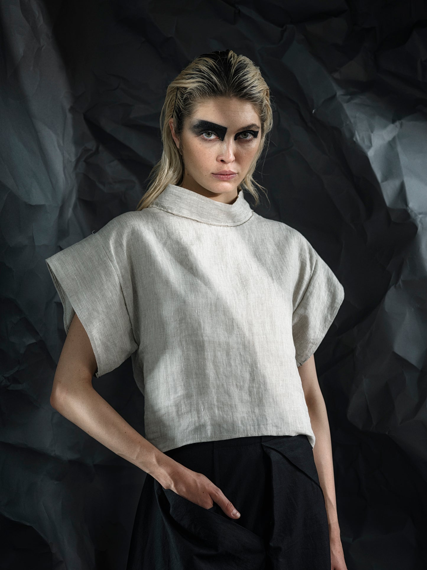 Minimalist linen crop top with a structured fit