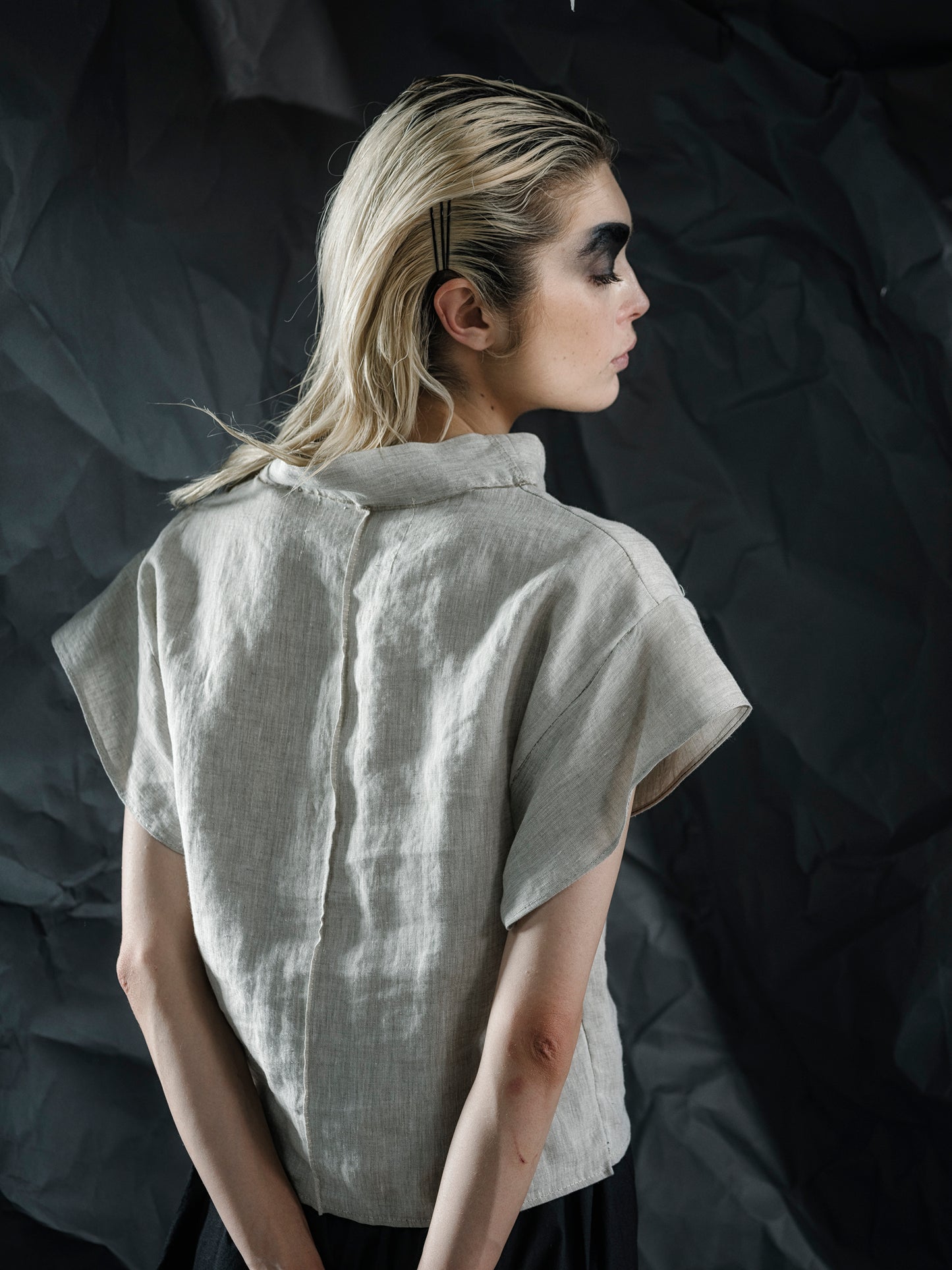 Minimalist linen crop top with a structured fit