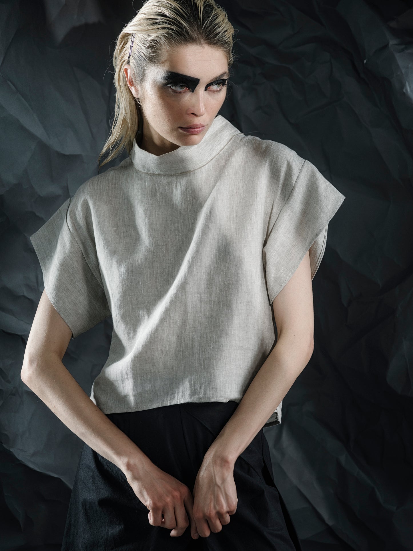 Minimalist linen crop top with a structured fit