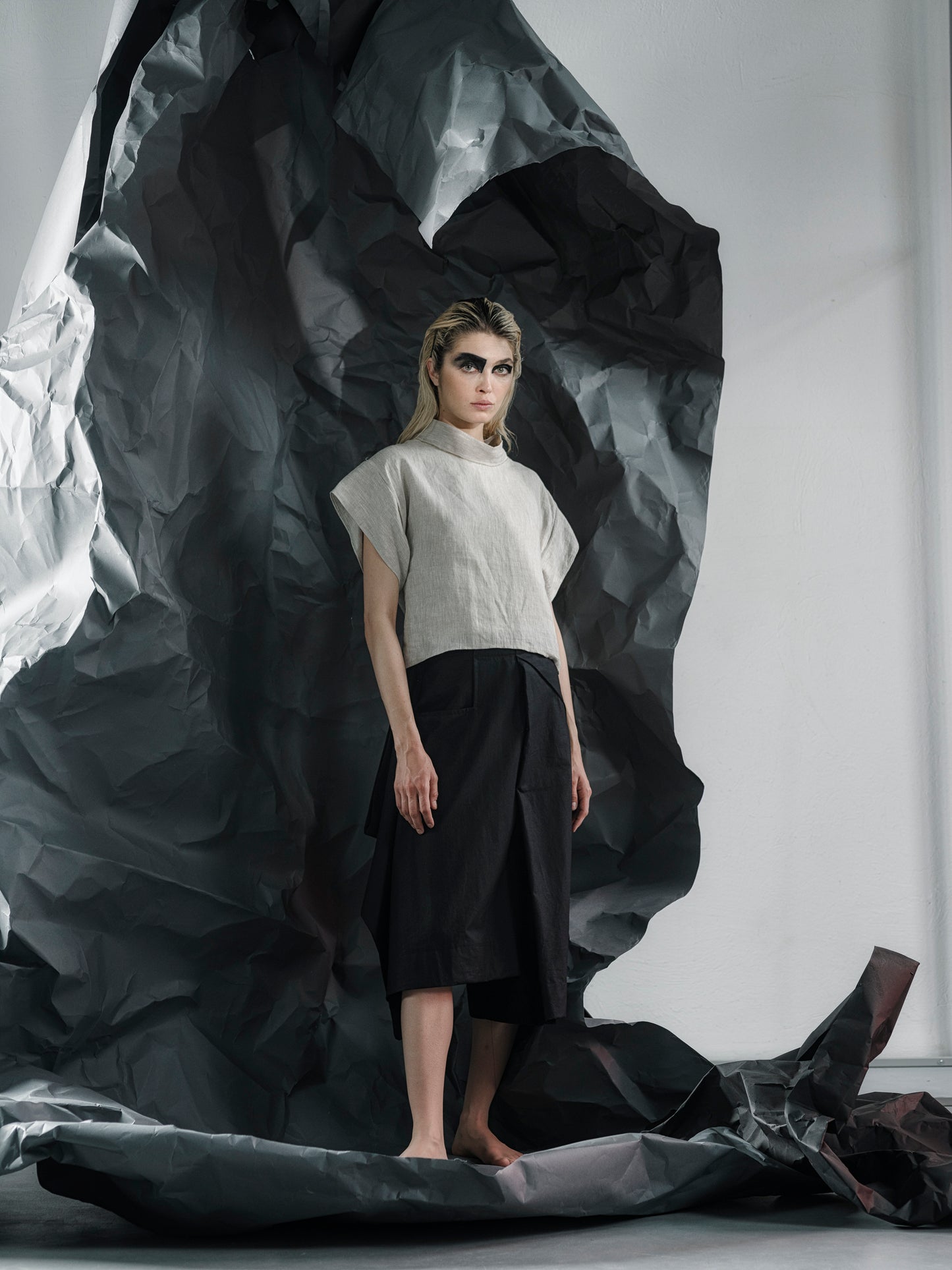 Minimalist linen crop top with a structured fit