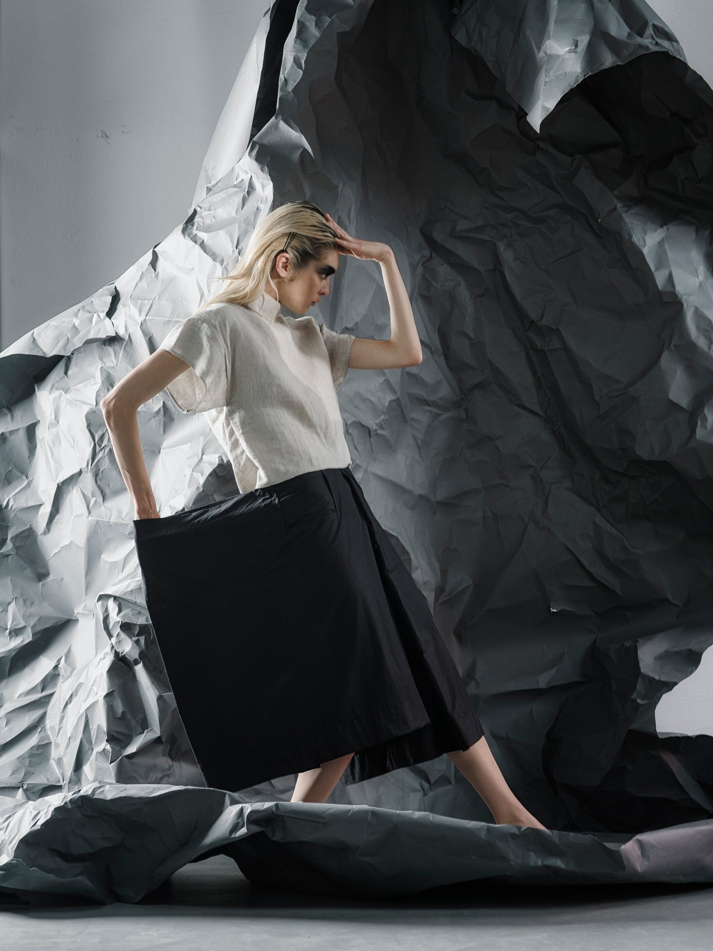 Minimalist linen crop top with a structured fit