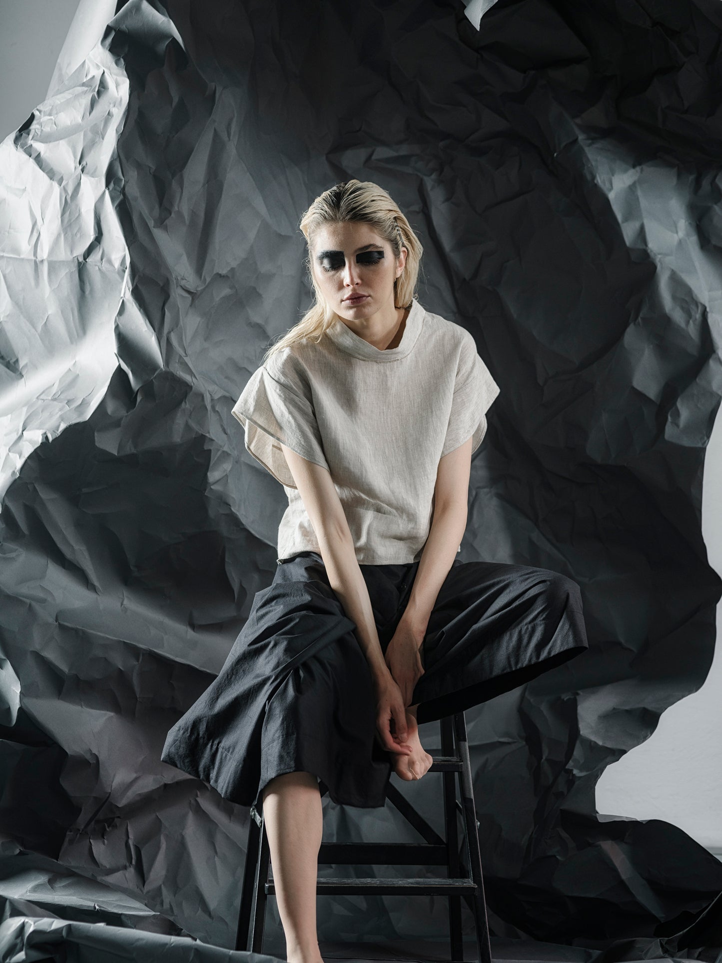 Minimalist linen crop top with a structured fit