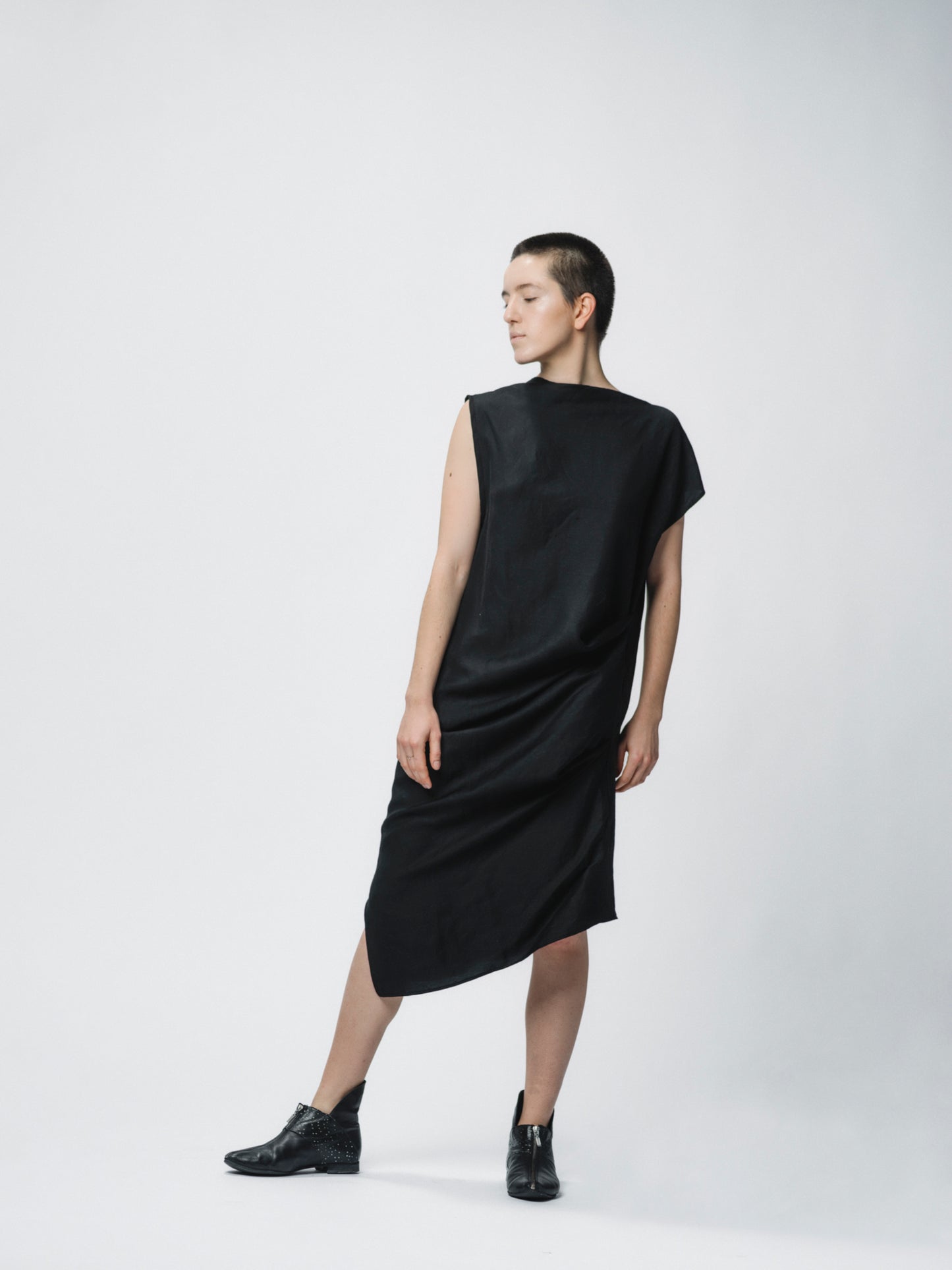 Sculptural draping linen dress with buttons closure on the shoulder