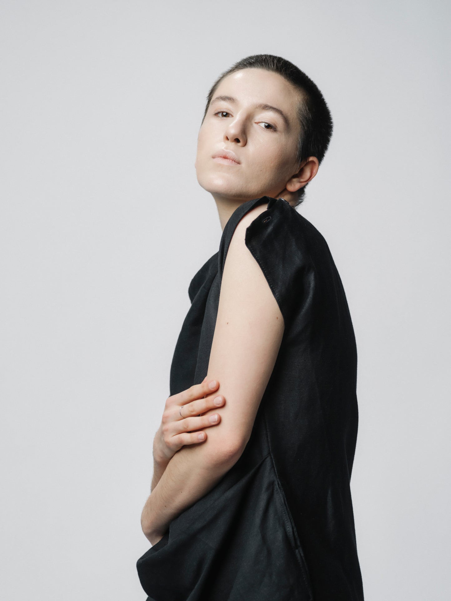 Sculptural draping linen dress with buttons closure on the shoulder