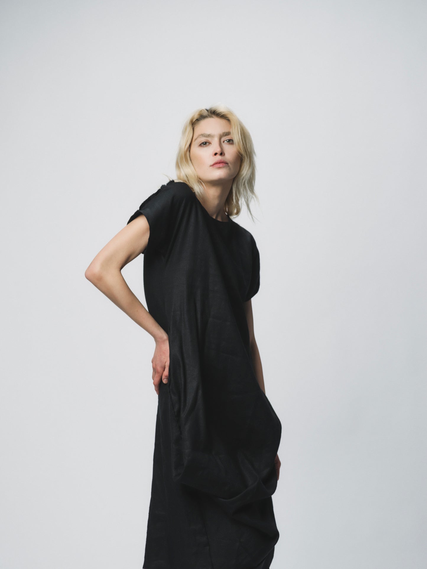 Sculptural draping linen dress