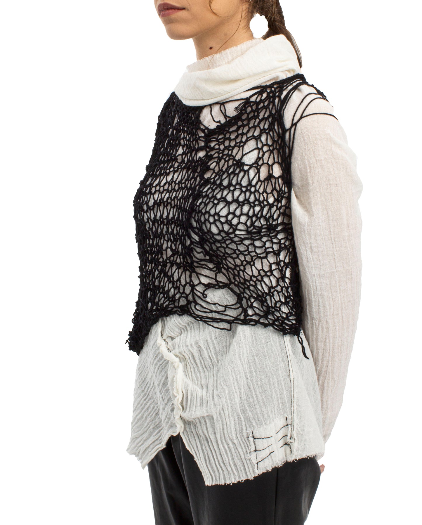 Deconstructed hand knitted avantgarde top